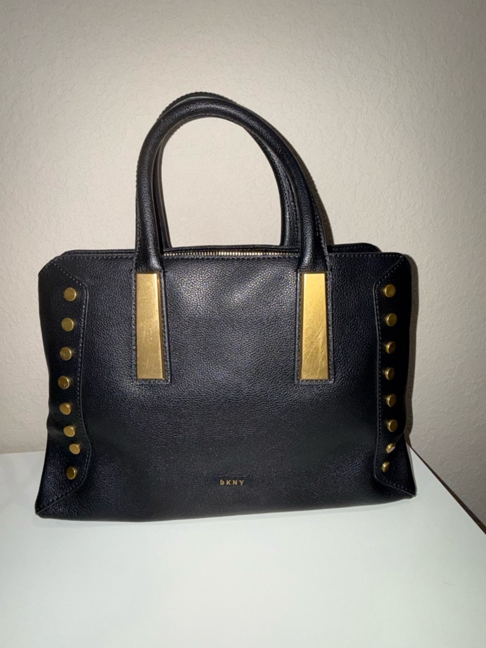 DKNY Black Leather Satchel with Gold Stud Accents